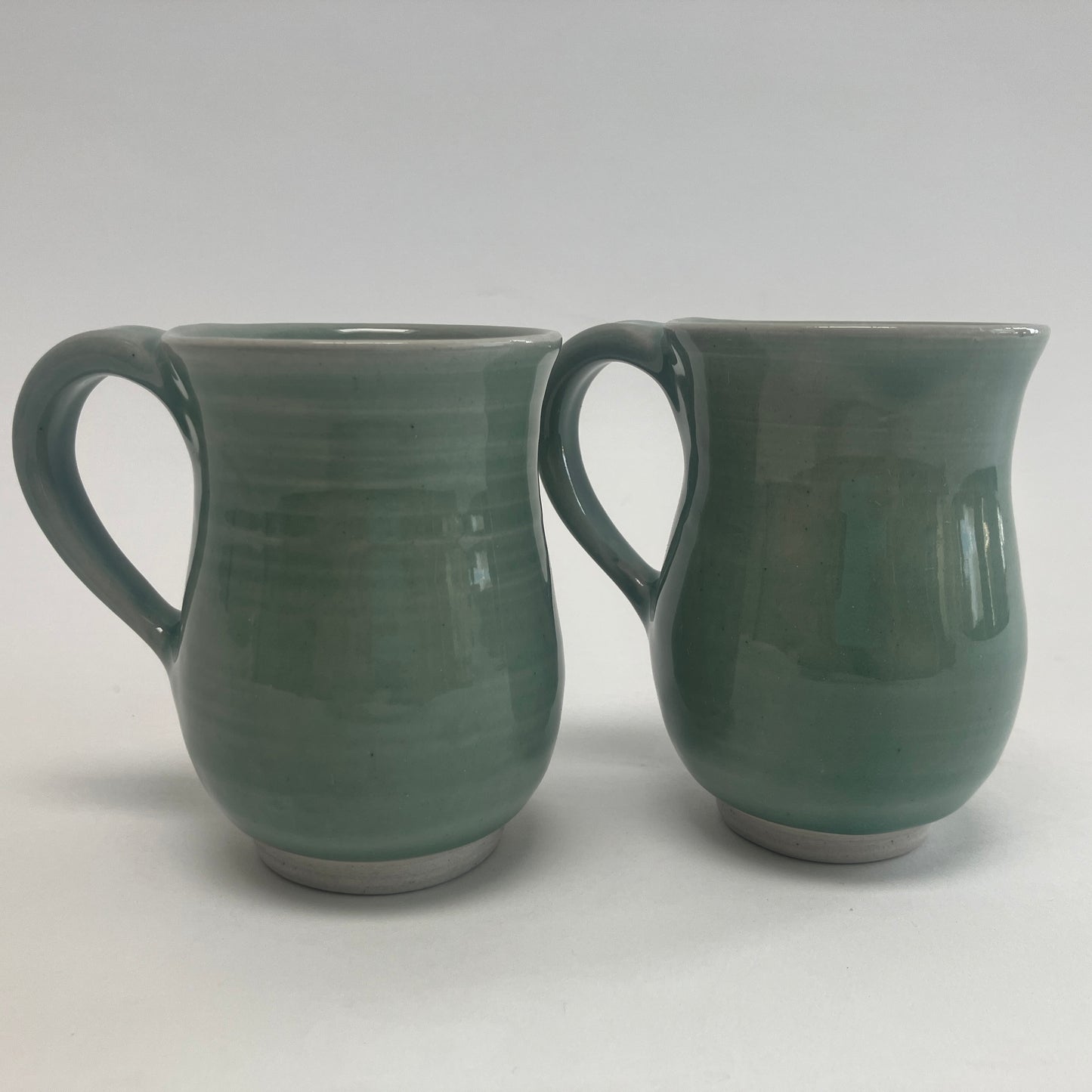Small Curvy Celadon Colored Mug