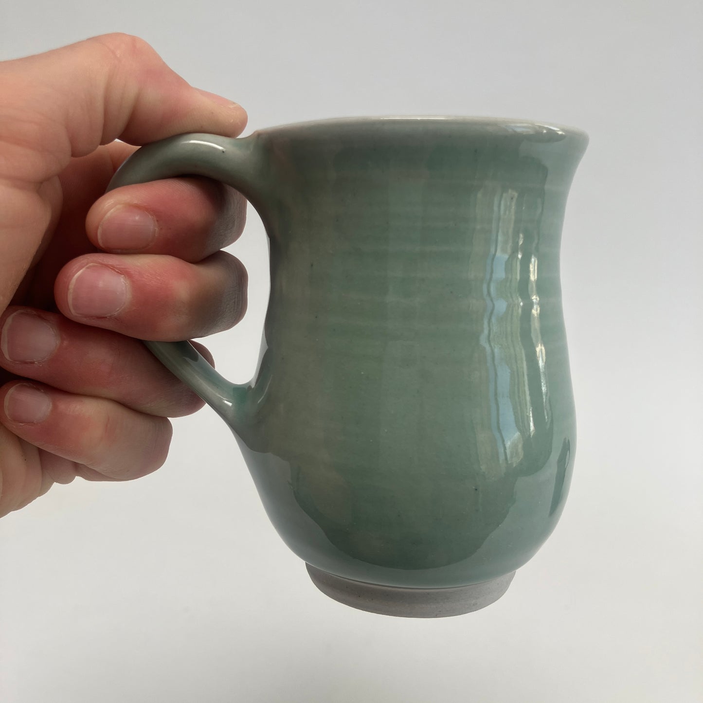 Small Curvy Celadon Colored Mug