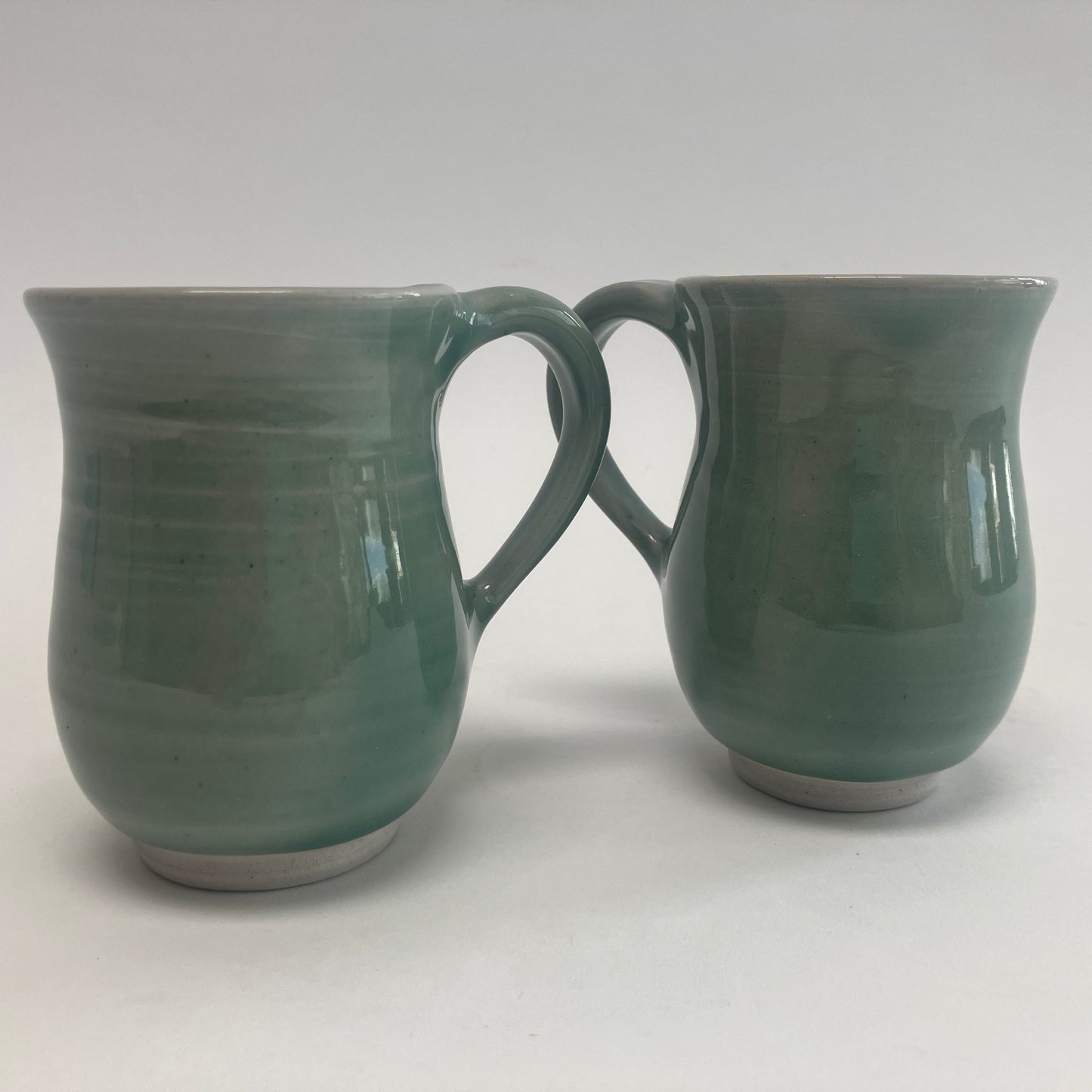 Small Curvy Celadon Colored Mug