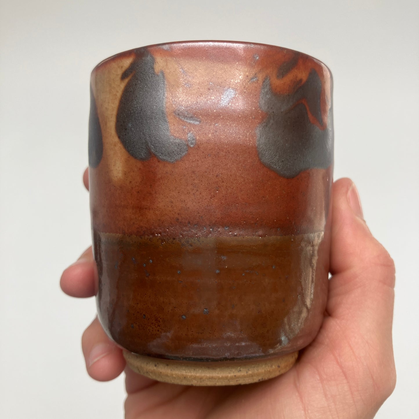 Teacup With Marbled Slip and Tenmoku