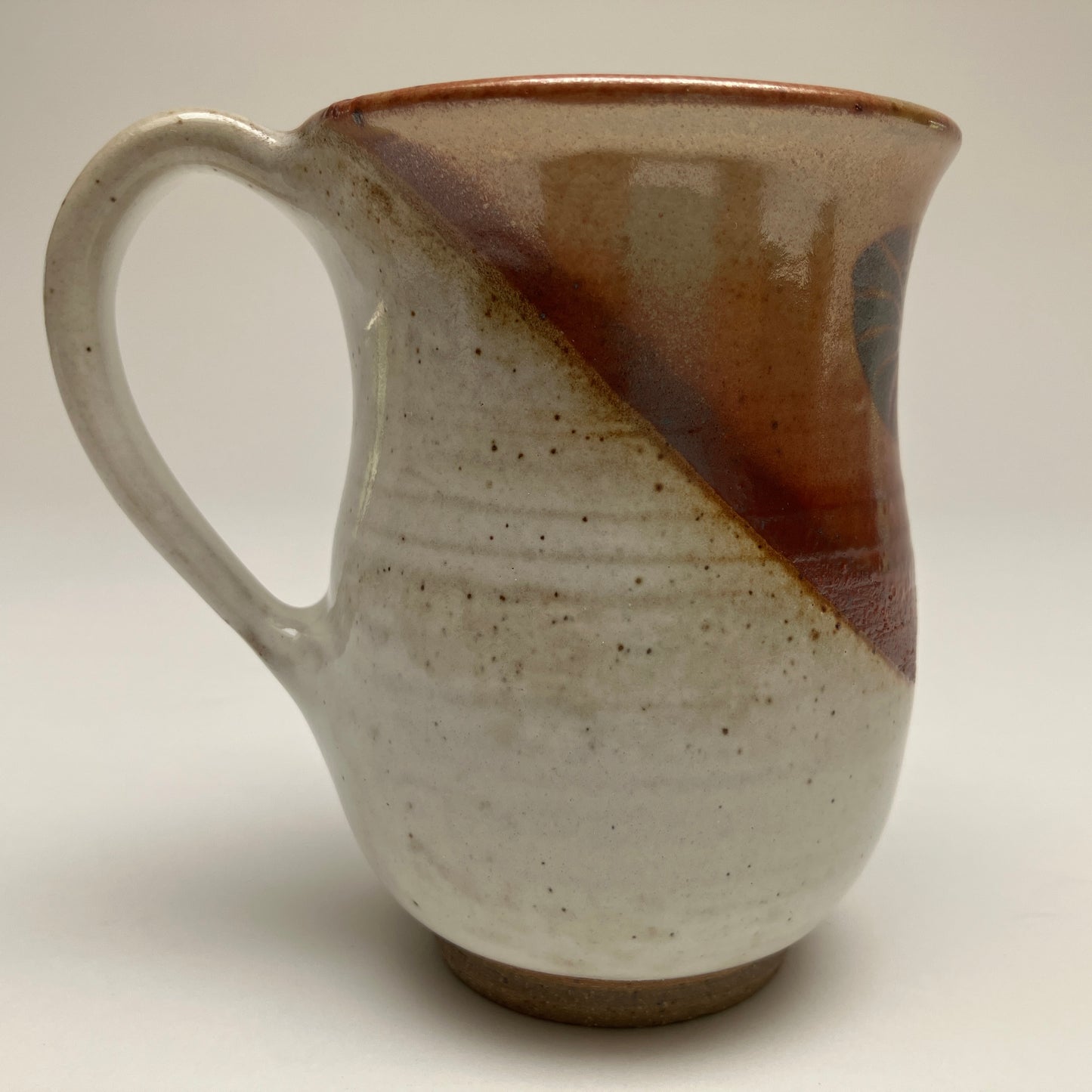 Small Curvy Mug With Whimsical Design