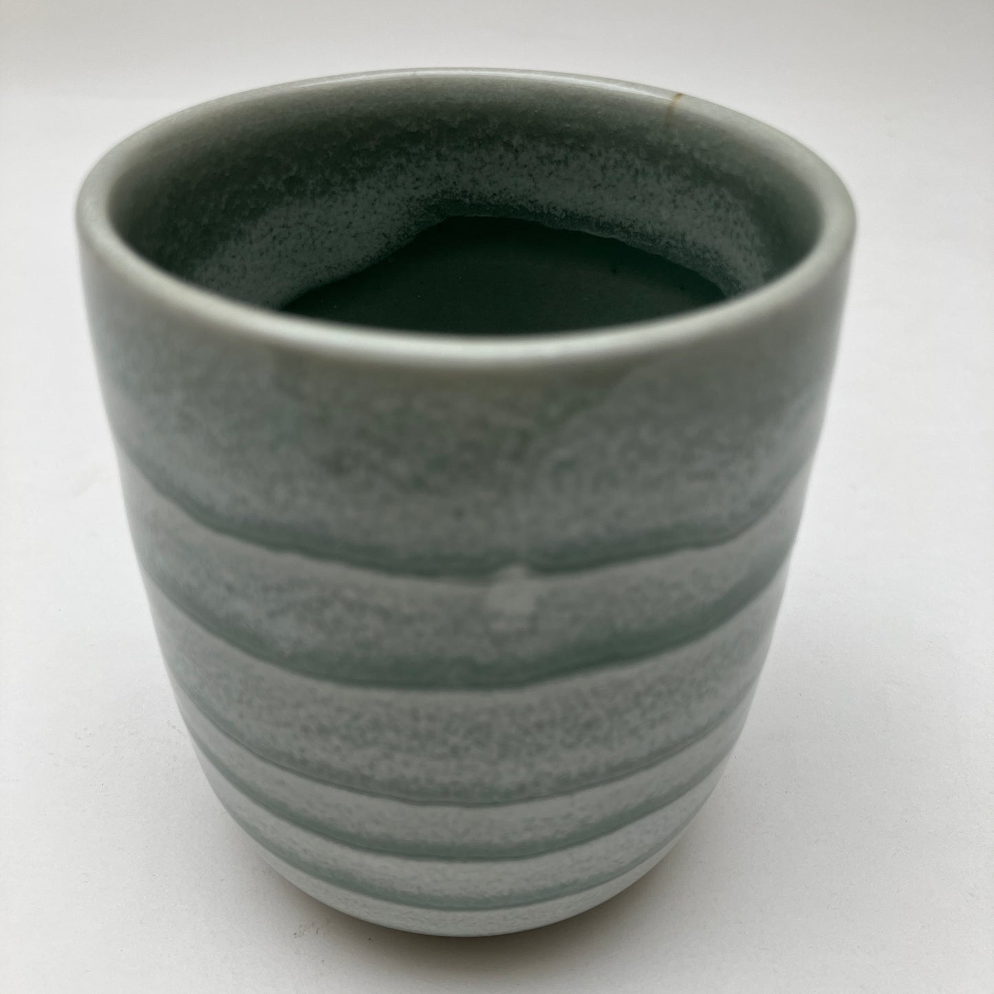 Teacup with Cream and Celadon Glaze Overlay