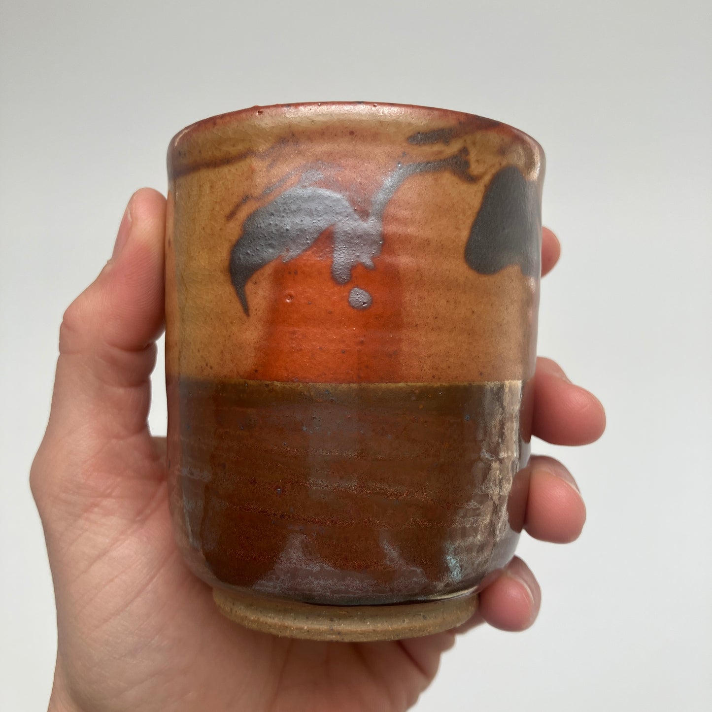 Teacup With Marbled Slip and Tenmoku