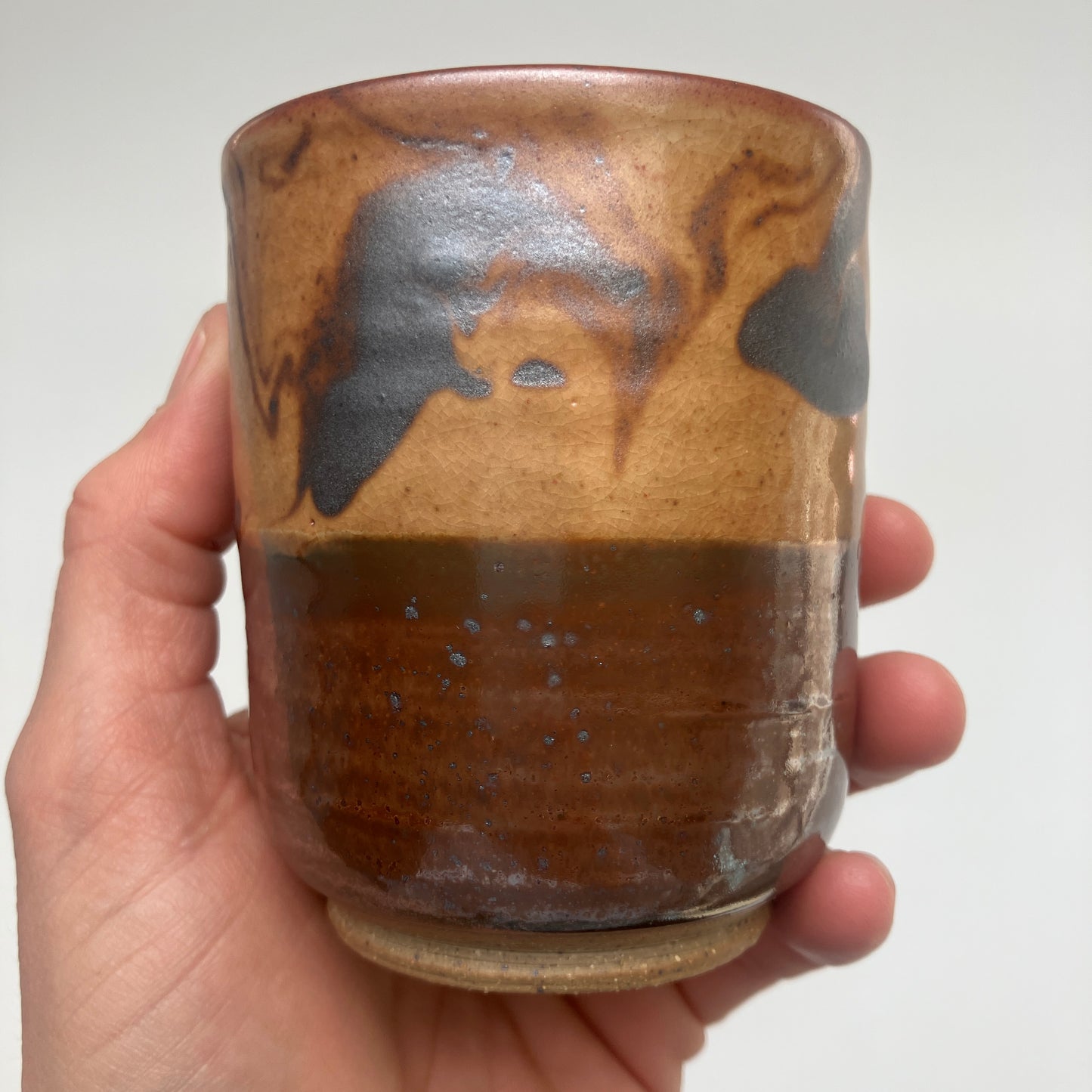 Teacup With Marbled Slip and Tenmoku