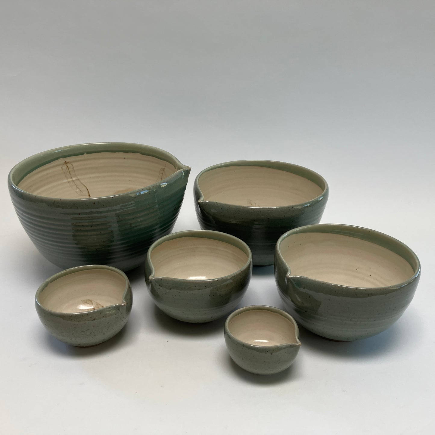 Six Piece Nesting Set of Bowls (Decorated with Feathers)