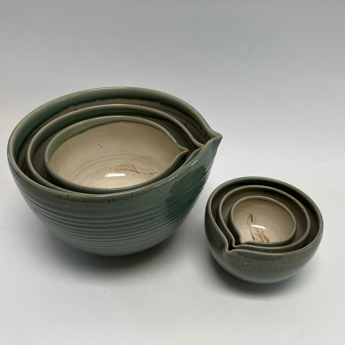 Six Piece Nesting Set of Bowls (Decorated with Feathers)