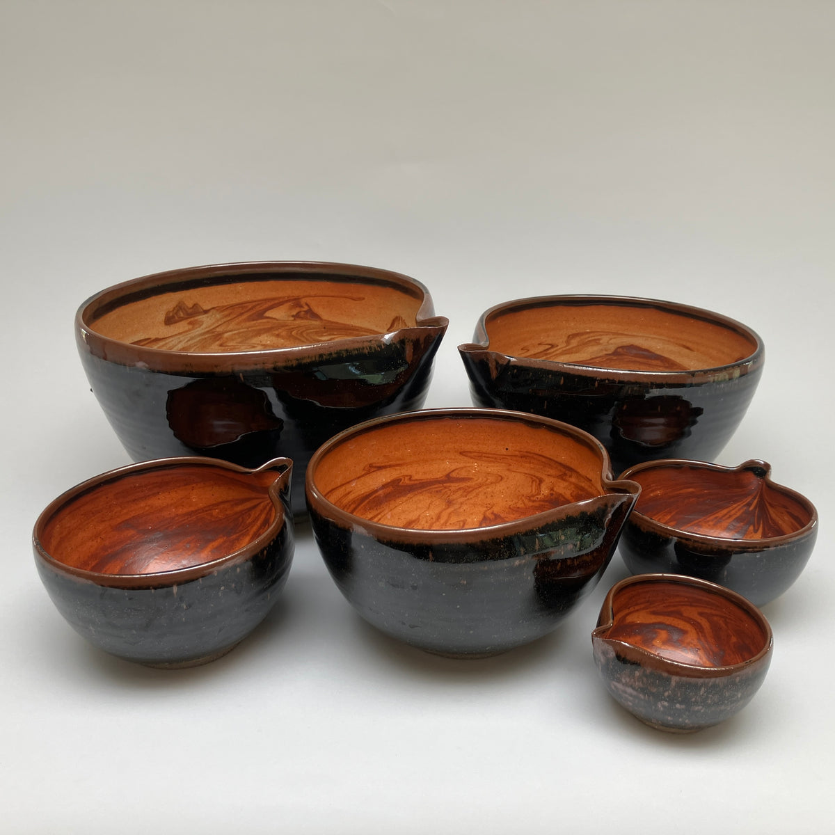 Six Piece Nesting Set of Bowls with Slip Marbling