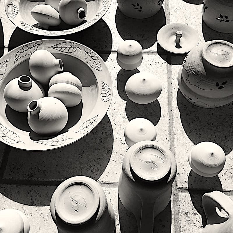  Ceramic Pieces with Carved Designs Drying