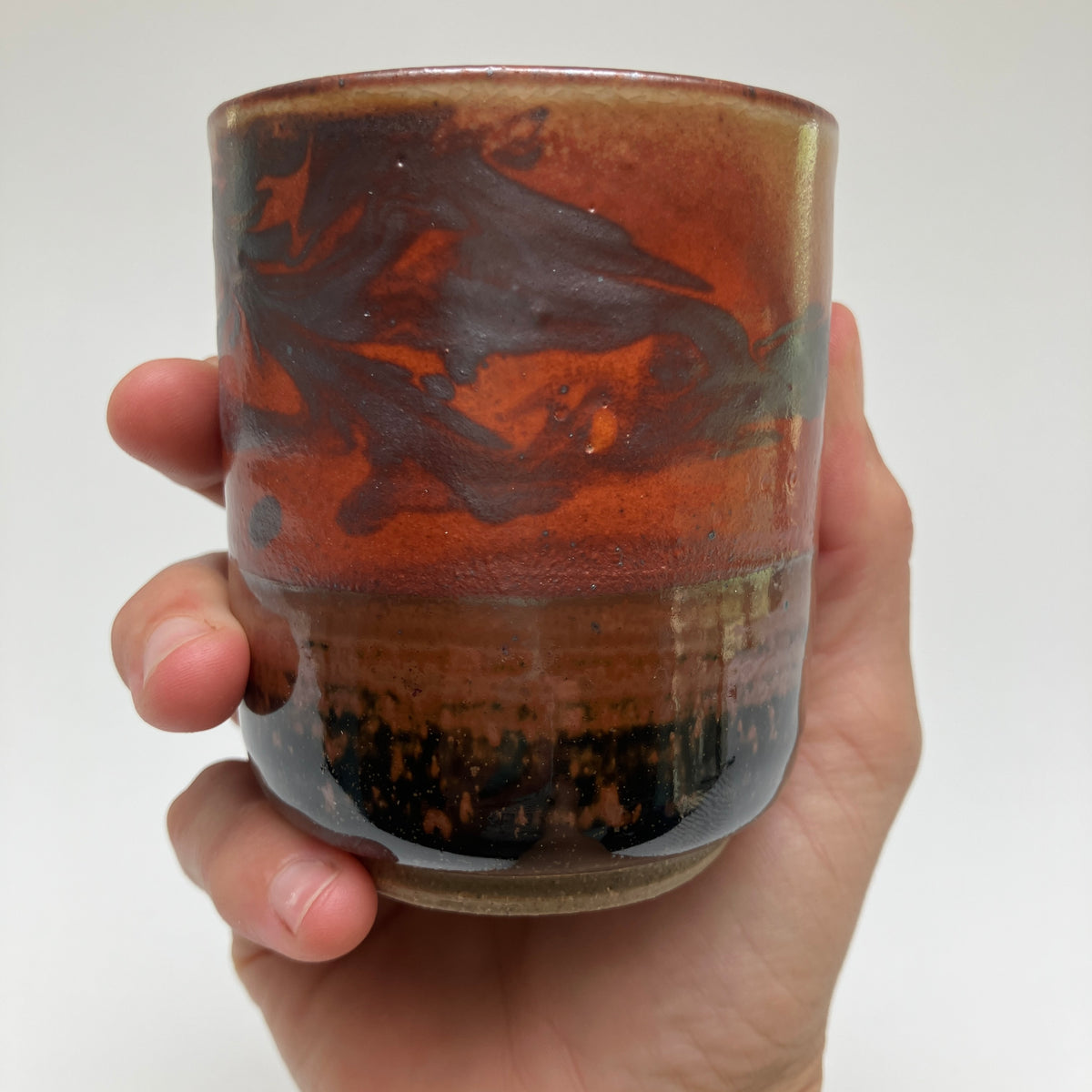 Teacup With Marbled Slip and Tenmoku
