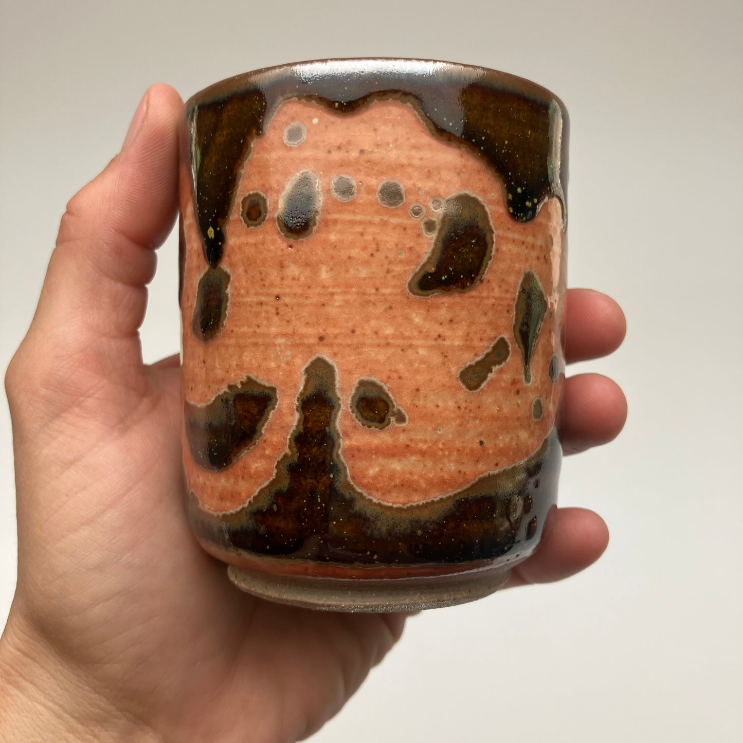 Teacup With Shino and Teadust Glaze Overlay