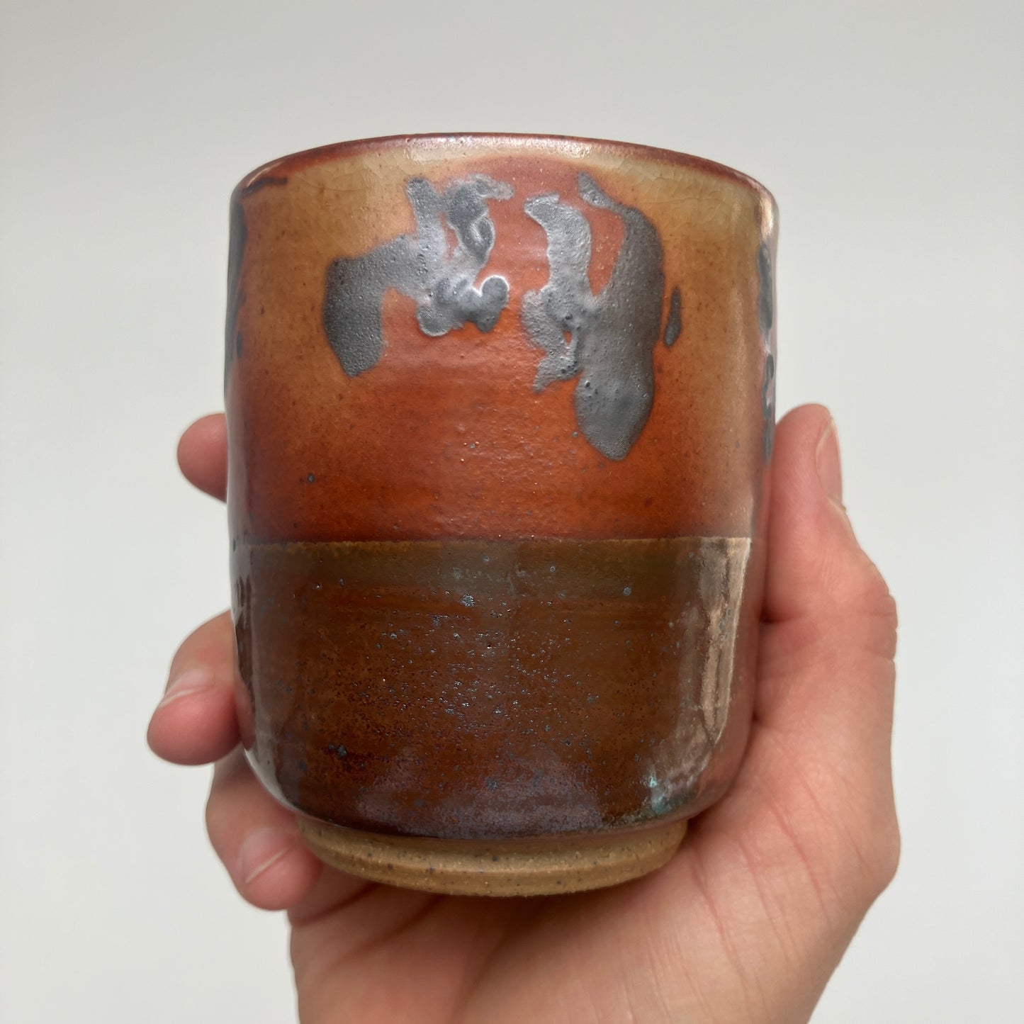 Teacup With Marbled Slip and Tenmoku