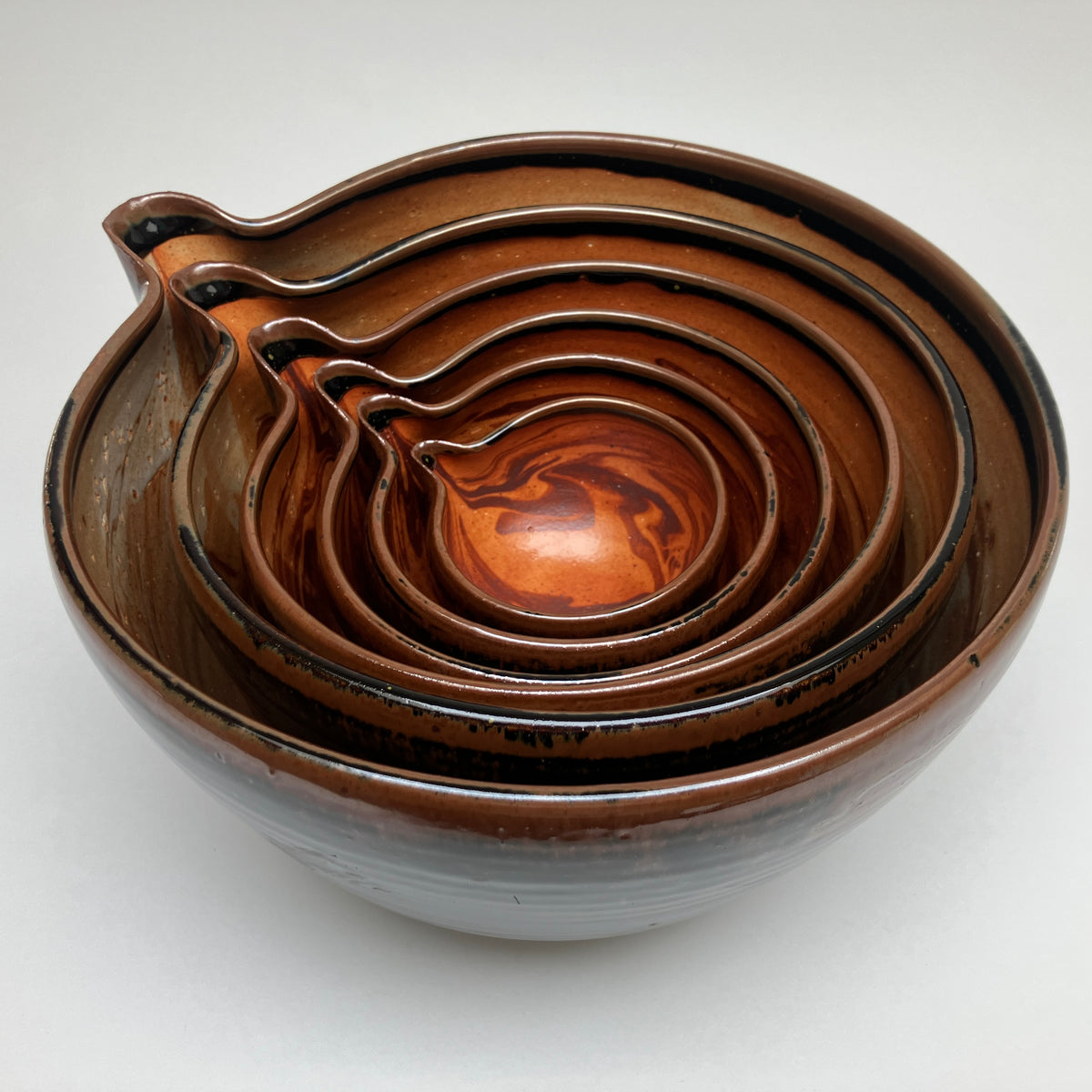 Six Piece Nesting Set of Bowls with Slip Marbling